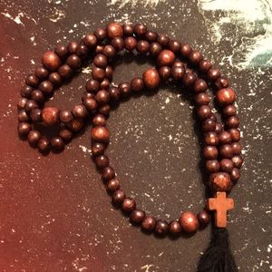 Small long beads wood with cross great!